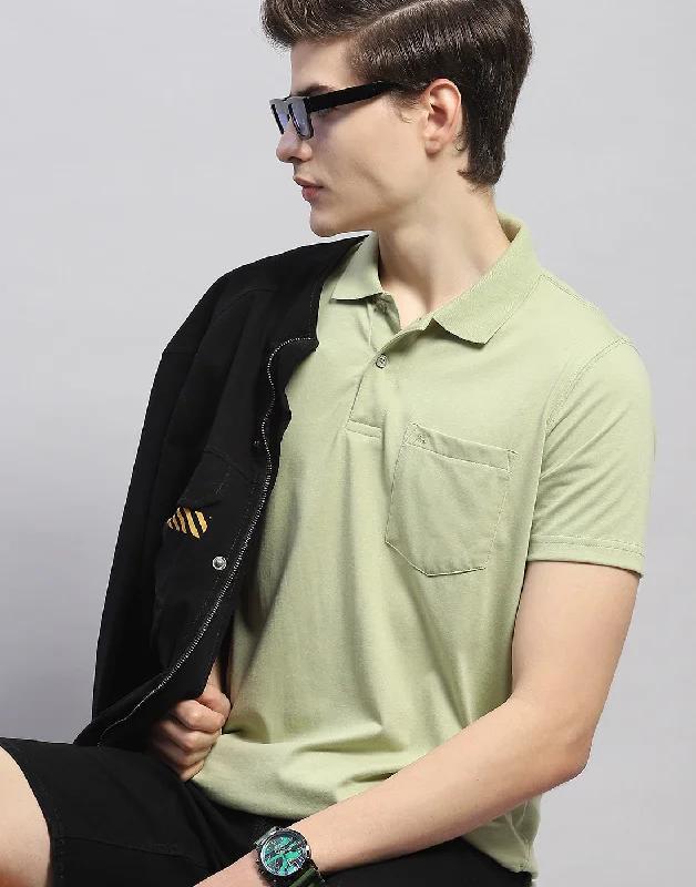 Men's travel-friendly t-shirt-Men Green Solid Polo Collar Half Sleeve T-Shirt